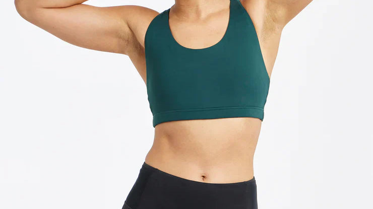 Woman wearing a high-support sports bra during a workout