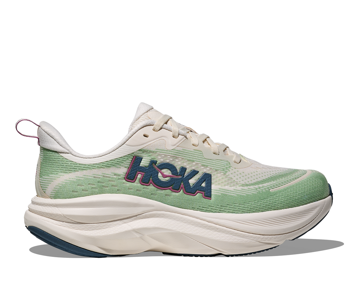 Women's Hoka Skyflow. Alabaster/Vintage Green. Lateral view.