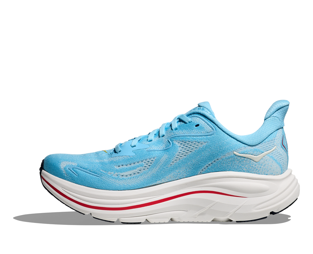 Women's Hoka Clifton 10. Light Blue upper. White midsole. Medial view.