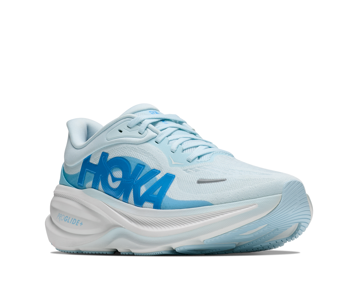 Women's Hoka Clifton Pro. Light Blue upper. White midsole. Lateral view.