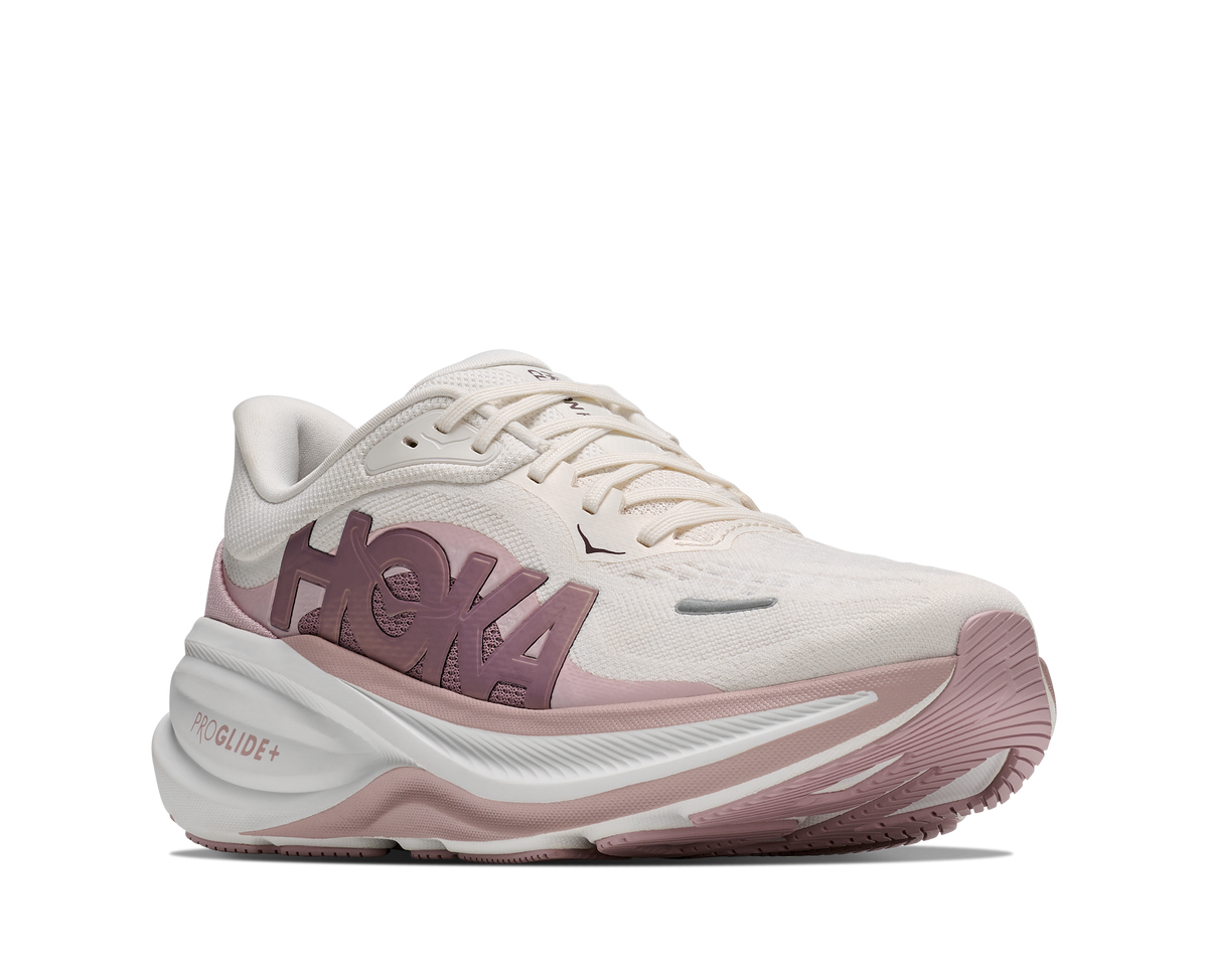 Women's HOKA Clifton Pro in Alabaster/Pink Opal, lateral view.