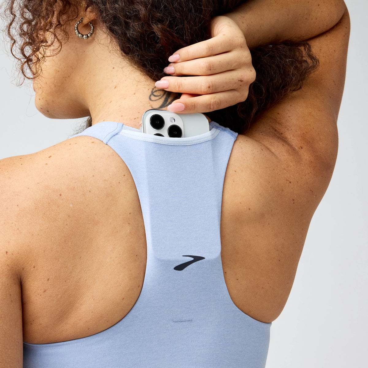 Women's Brooks Luxe Pocket Sports Bra in Heather Halogen Blue, detail view