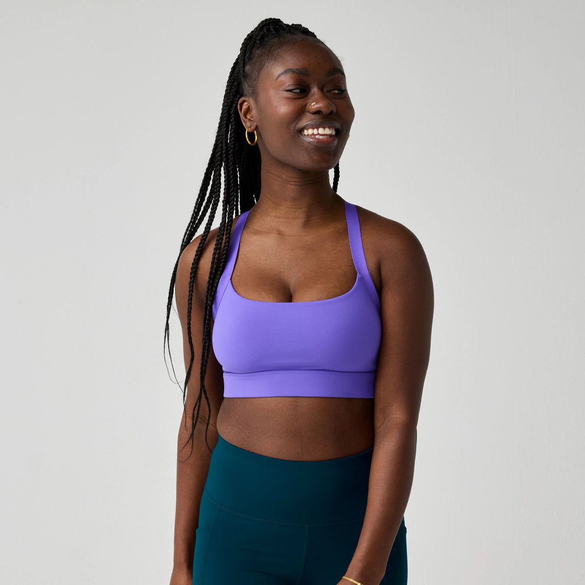 Women's Brooks Luxe Strappy Sports Bra in Violet, front view.
