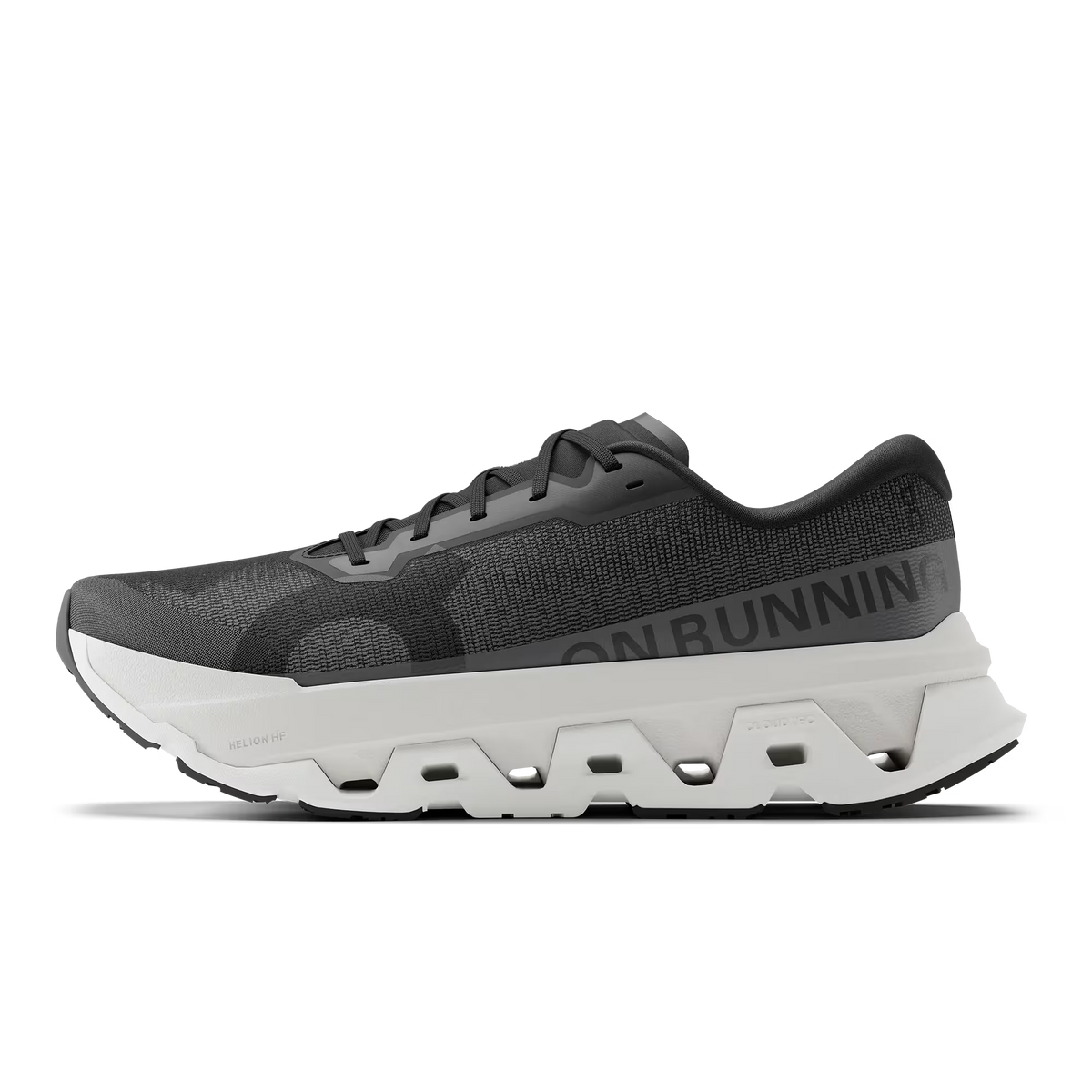 Men's On Running. Cloudmonster 3 Hyper. Black upper. White midsole. Medial view.