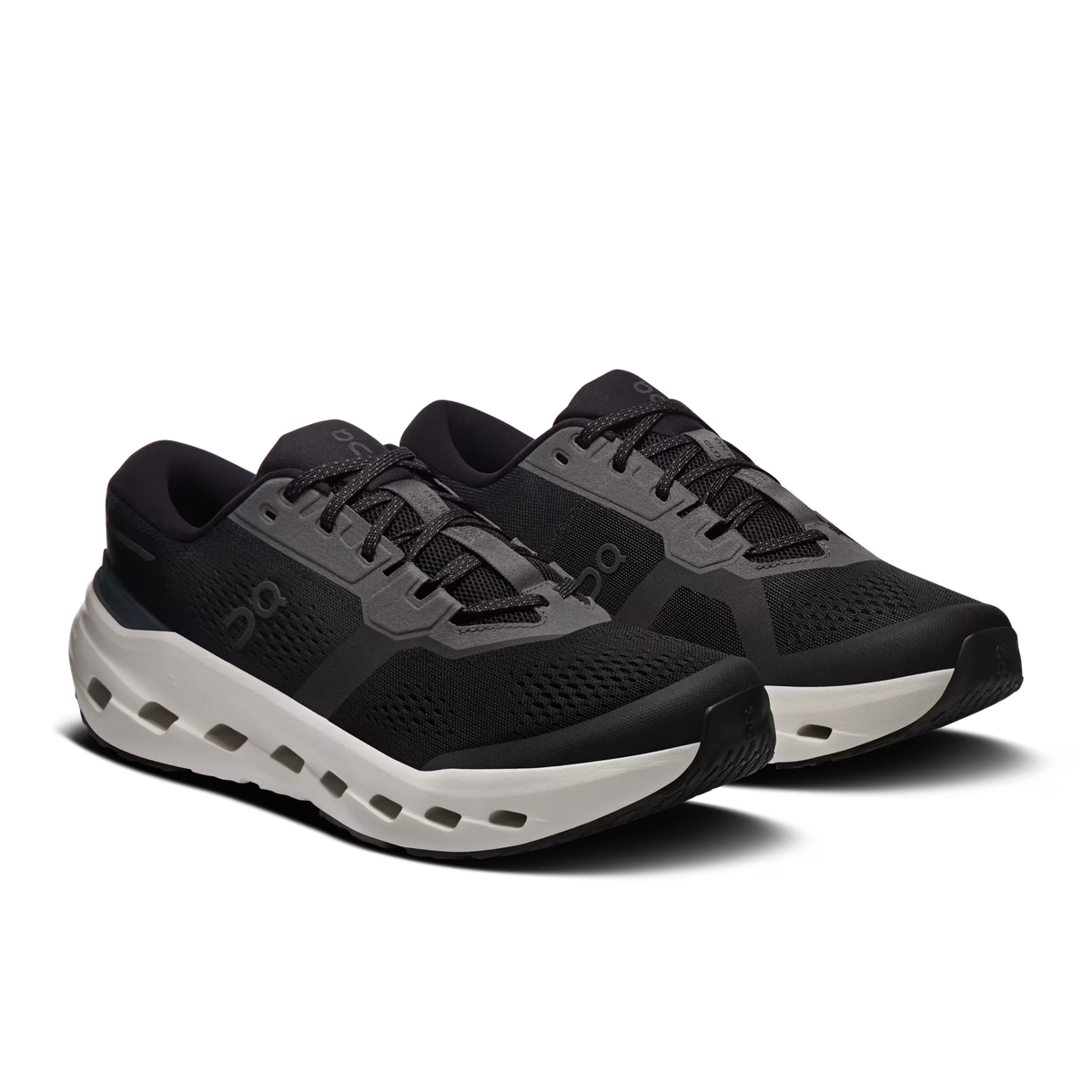 Men's On Running Cloudrunner 3. Black upper. White midsole. Lateral view.