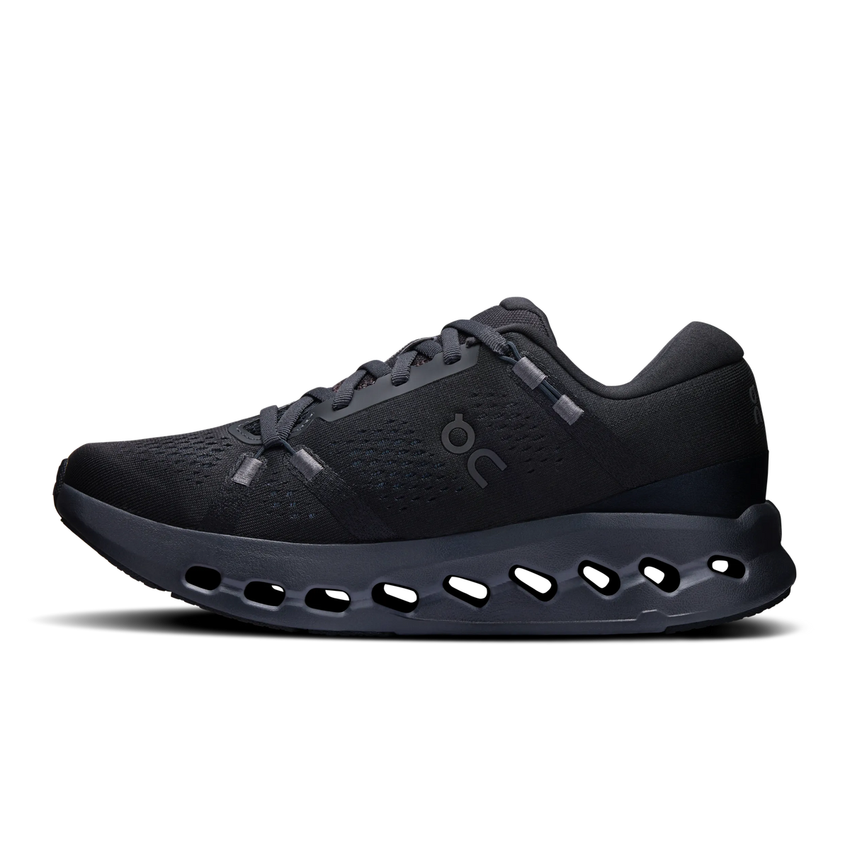Women's On Cloudsurfer 2. Black upper. Black midsole. Medial view.