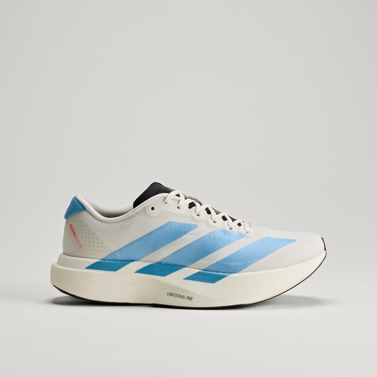 Adidas Adizero Evo SL Woven women's running shoe in Off White/Light Blue/Off White — side profile
