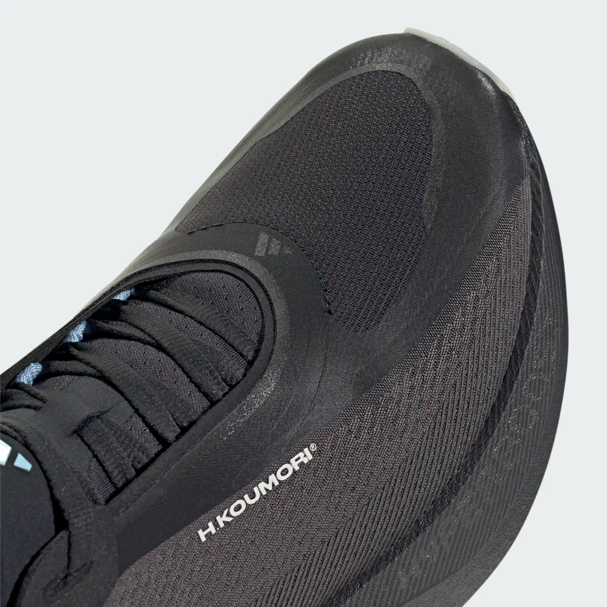 Adidas Hyperboost Edge men's shoes in Charcoal/Night Grey/Alumina — upper and lace detail.