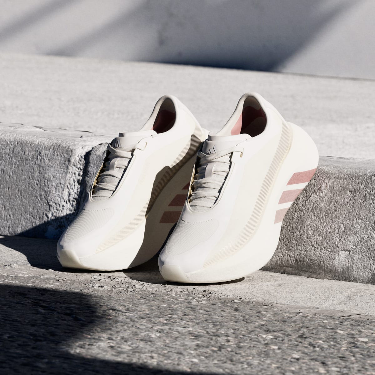 Adidas Hyperboost Edge women's running shoe in Off White/Vapour Pink/Matte Silver - front three-quarter view
