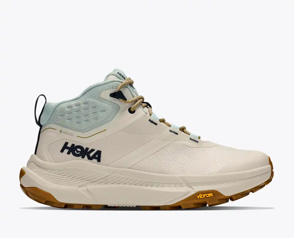 HOKA Transport Hike GTX women's hiking shoe in Alabaster/Glimmering Blue, lateral side view