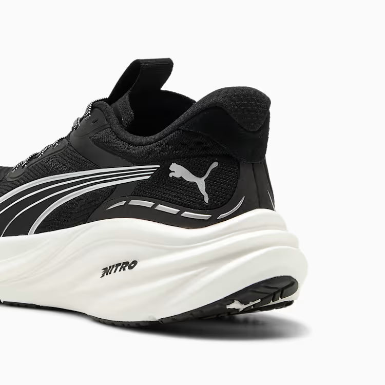 Black and white running shoe with Puma logo on a white background