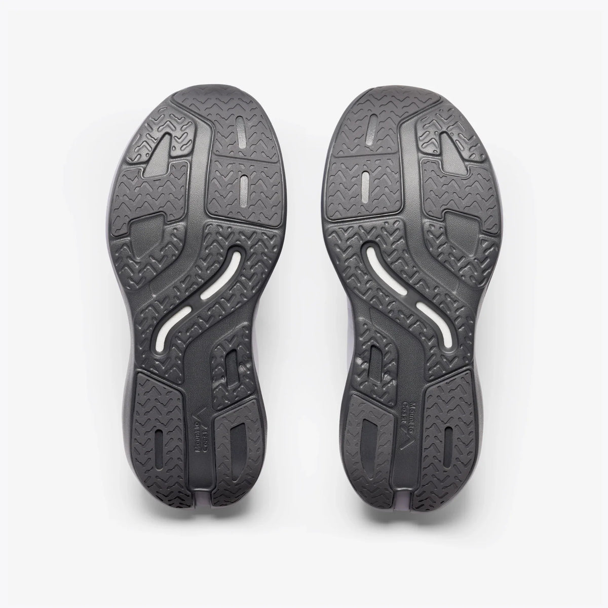 Pair of women's Mount to Coast C1 shoes in Ultraviolet, outsole view.