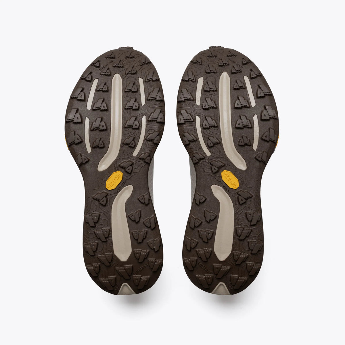 Pair of men's Mount to Coast T1 shoes in Dune, outsole view.