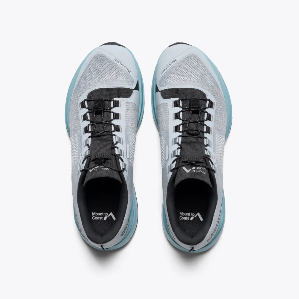 Pair of women's Mount to Coast T1 shoes in Snow Line, top view.