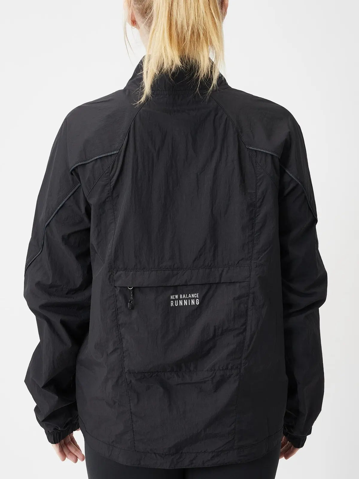 New Balance women's Impact Run Jacket in Black, rear view