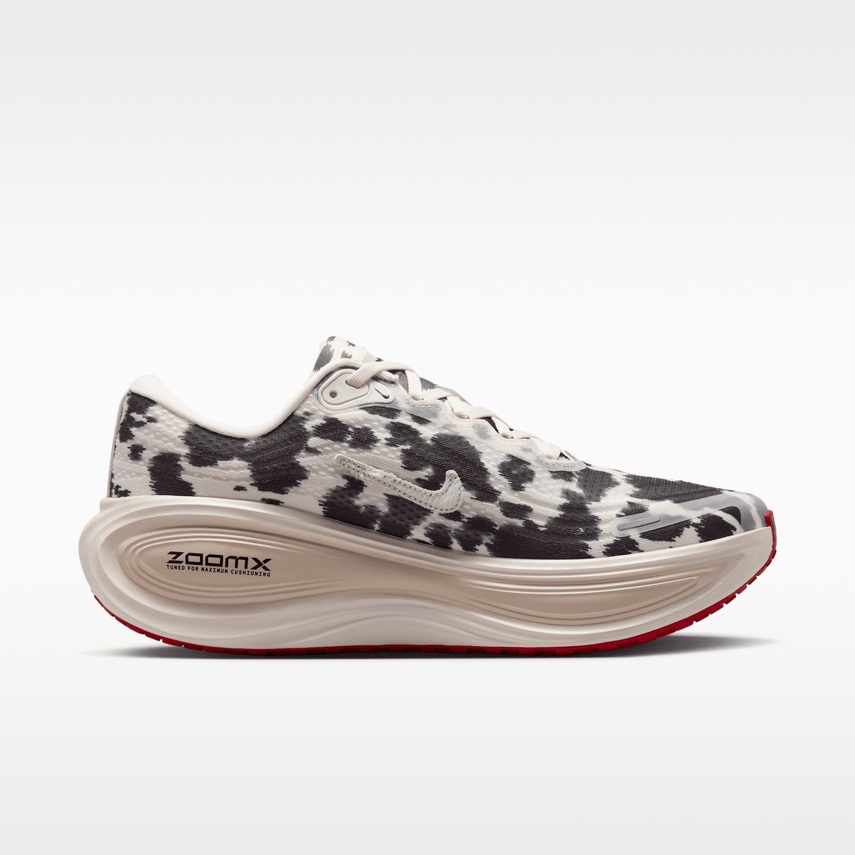 Nike Vomero Plus men's shoes in Sail/Black/University Red with animal-print upper — opposite side profile.