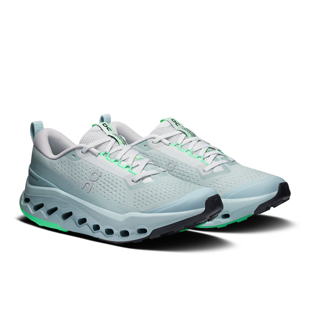 On Running Cloudsurfer Trail 2 women's trail running shoe in Chalk/Gardenia — front three-quarter view of the pair