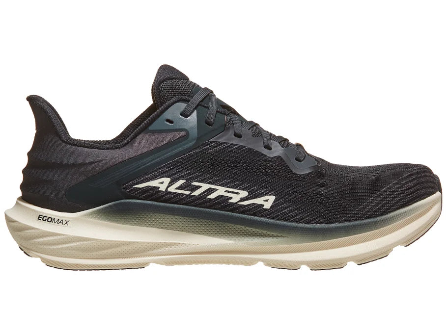 Men's Altra Torin 8. Black upper. White midsole. Medial view.