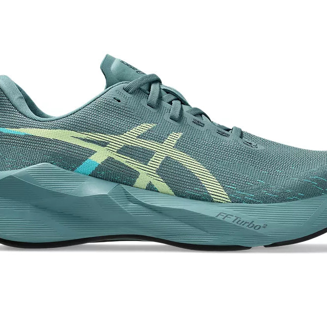 Men's Asics Novablast 6. Green upper. Green midsole. Lateral view.