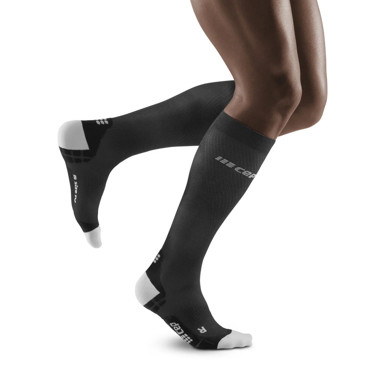 Men's CEP Ultralight Tall Compression Socks. Black. Lateral view.
