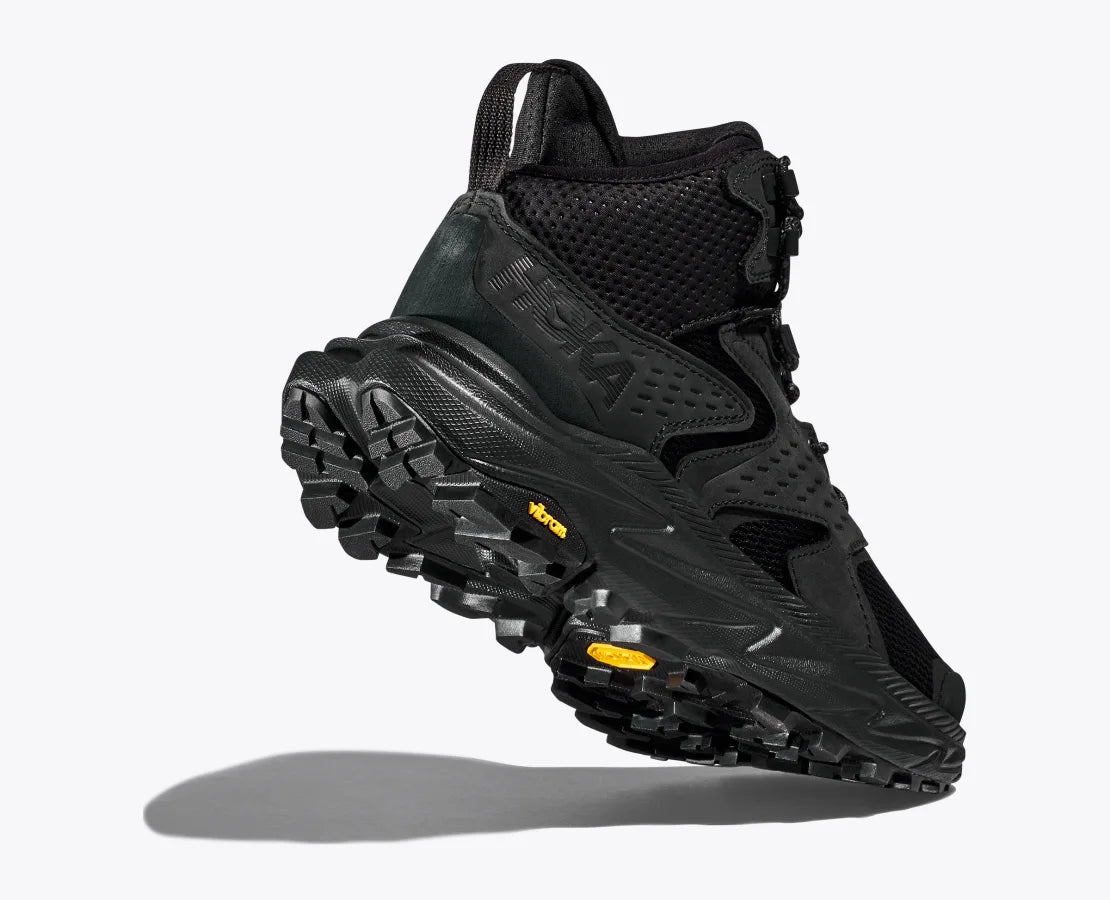 Men's Hoka Anacapa 2 Mid GTX. Black upper. Black midsole. Lateral view.