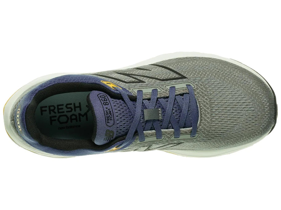Men's New Balance 860 v14. Grey upper. Off White midsole. Top view.