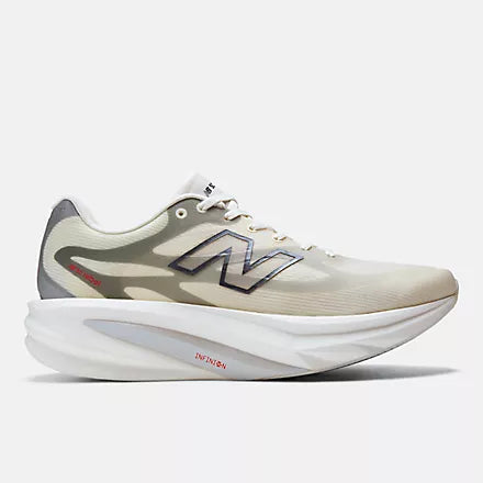 Men's New Balance Supercomp Rebel. Beige upper. White midsole. Lateral view.