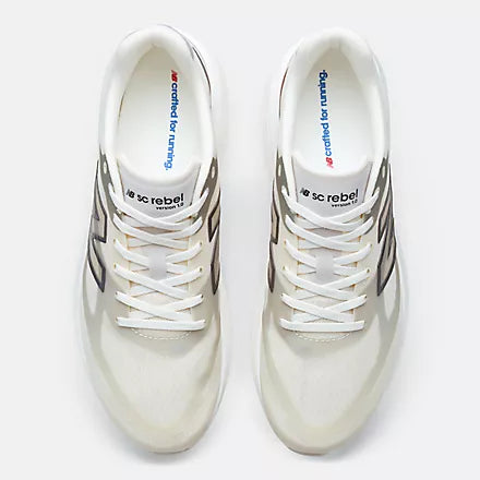 Men's New Balance Supercomp Rebel. Beige upper. White midsole. Top view.