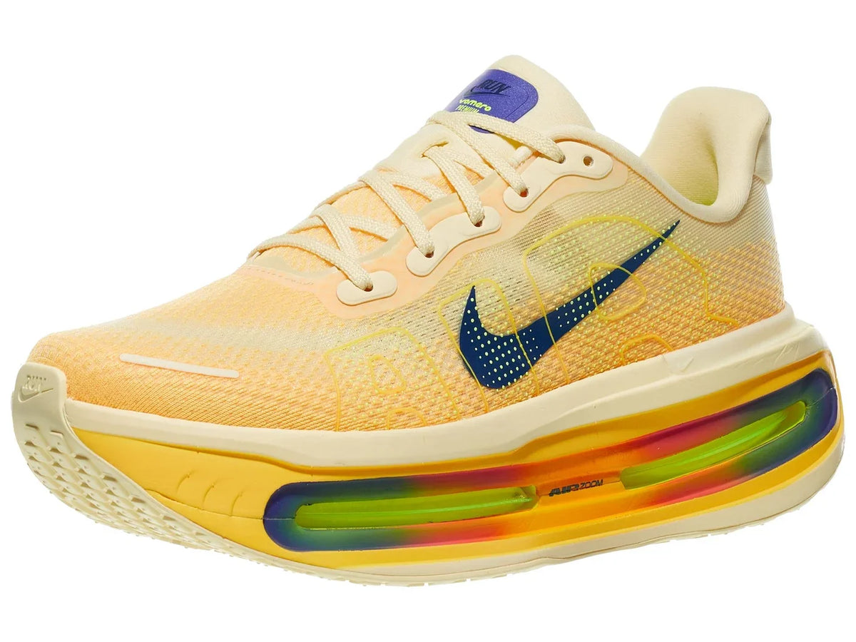 Men's Nike Vomero Premium. Orange upper. Cream, orange, rainbow midsole. Lateral view.