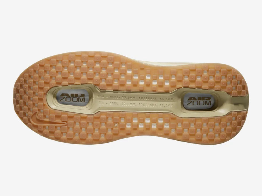 Men's Nike Vomero Premium. Beige upper. Beige midsole. Bottom view.