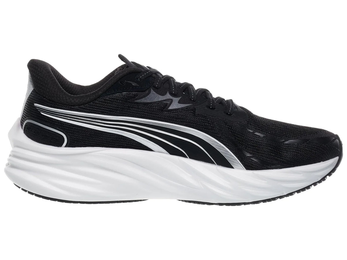 Men's Puma Velocity Nitro 4. Black upper. White midsole. Medial view.