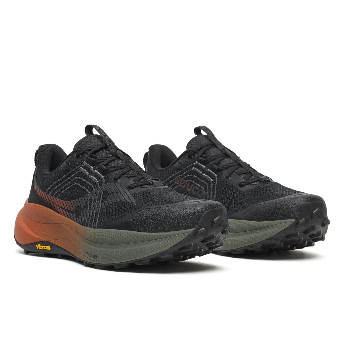 Men's Saucony Xodus Ultra 4. Black upper. Brown midsole. Lateral view.