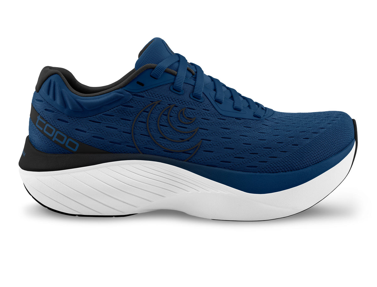 Men's Topo Athletic Atmos. Navy blue upper. White midsole. Lateral view.