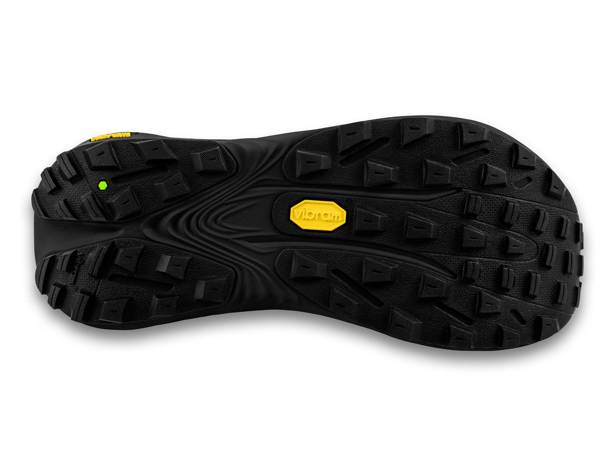 Men's Topo Vista. Black upper. Black midsole. Bottom view.