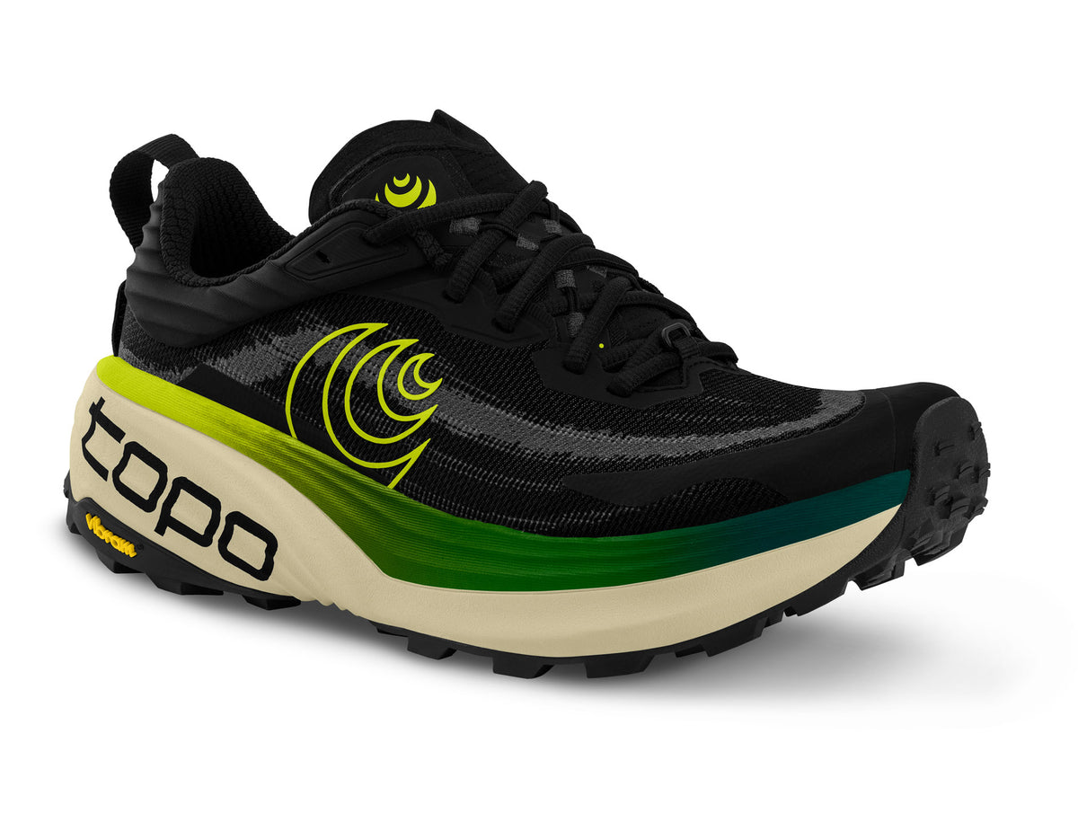 Men's Topo Vista. Black upper. Tan midsole. Lateral view.