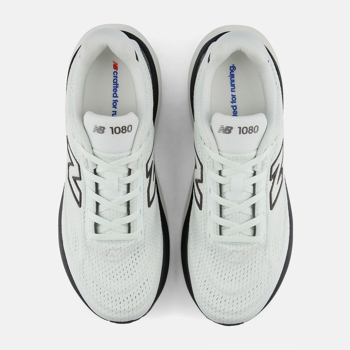 New Balance 1080 v15 women's running shoe in Mint Water/Black Metallic — top view