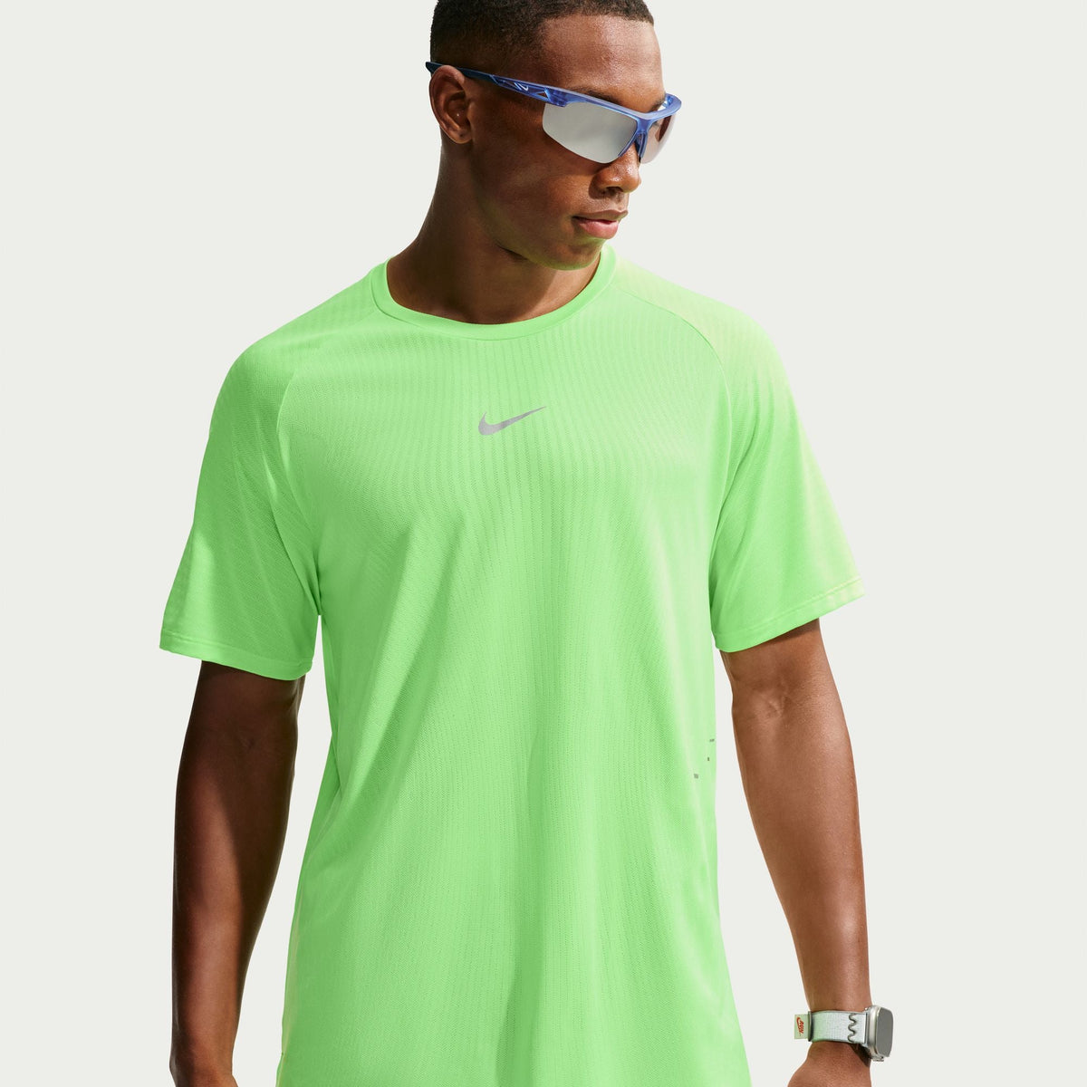Men's Nike Stride Aero-Fit Short Sleeve Running Shirt in Volt/Light Silver, front view.