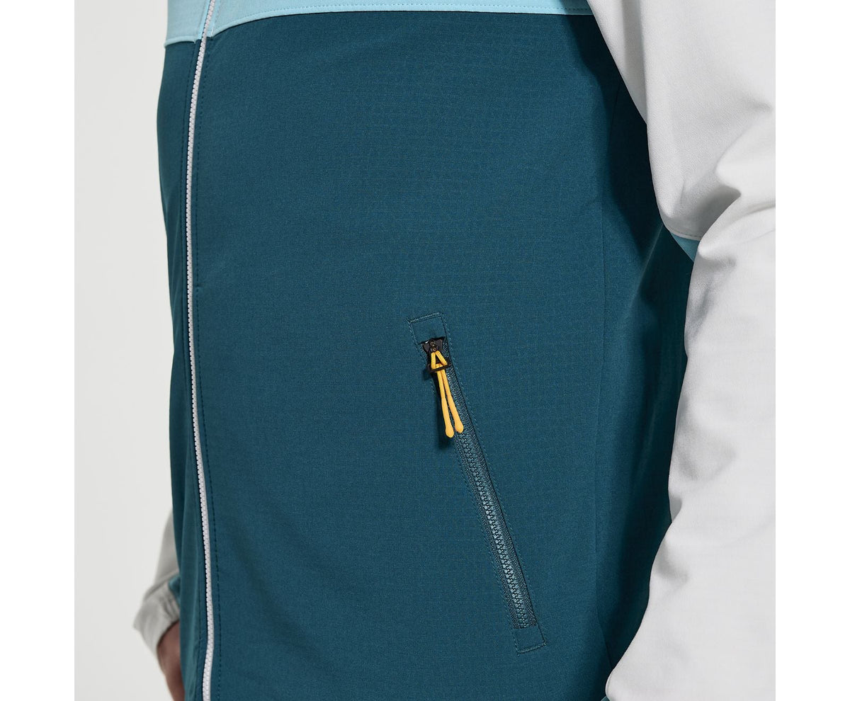 Men's Saucony Bluster Jacket. White/Green. Pocket closeup.