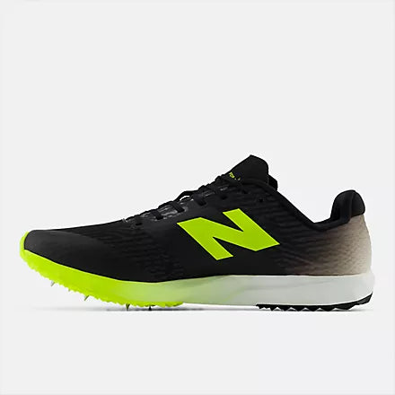 New Balance FuelCell X-7 v5. Black upper. Green/White midsole. Medial view.