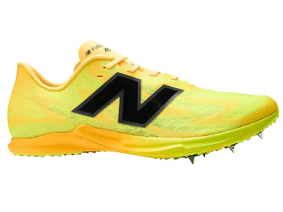 New Balance FuelCell XC-X. Yellow upper. Orange midsole. Lateral view.