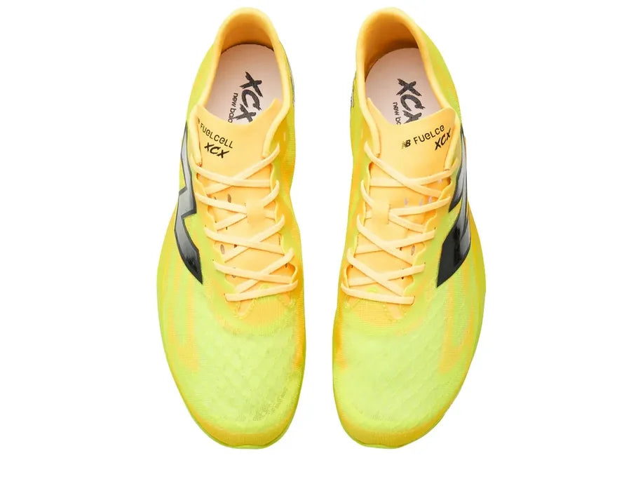 New Balance FuelCell XC-X. Yellow upper. Orange midsole. Top view.