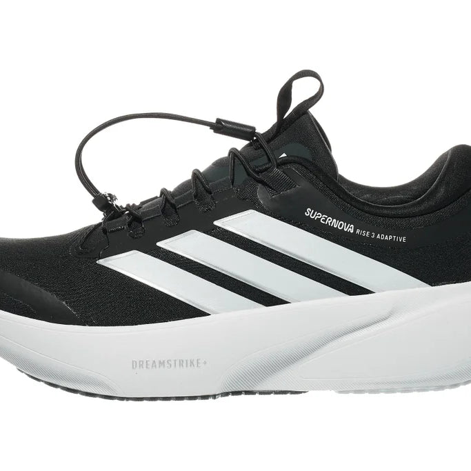 Women's Adidas Supernova Adaptive. Black upper. White midsole. Lateral view.
