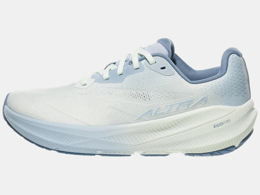 Women's Altra Experience Flow 3. White upper. Light blue midsole. Lateral view.