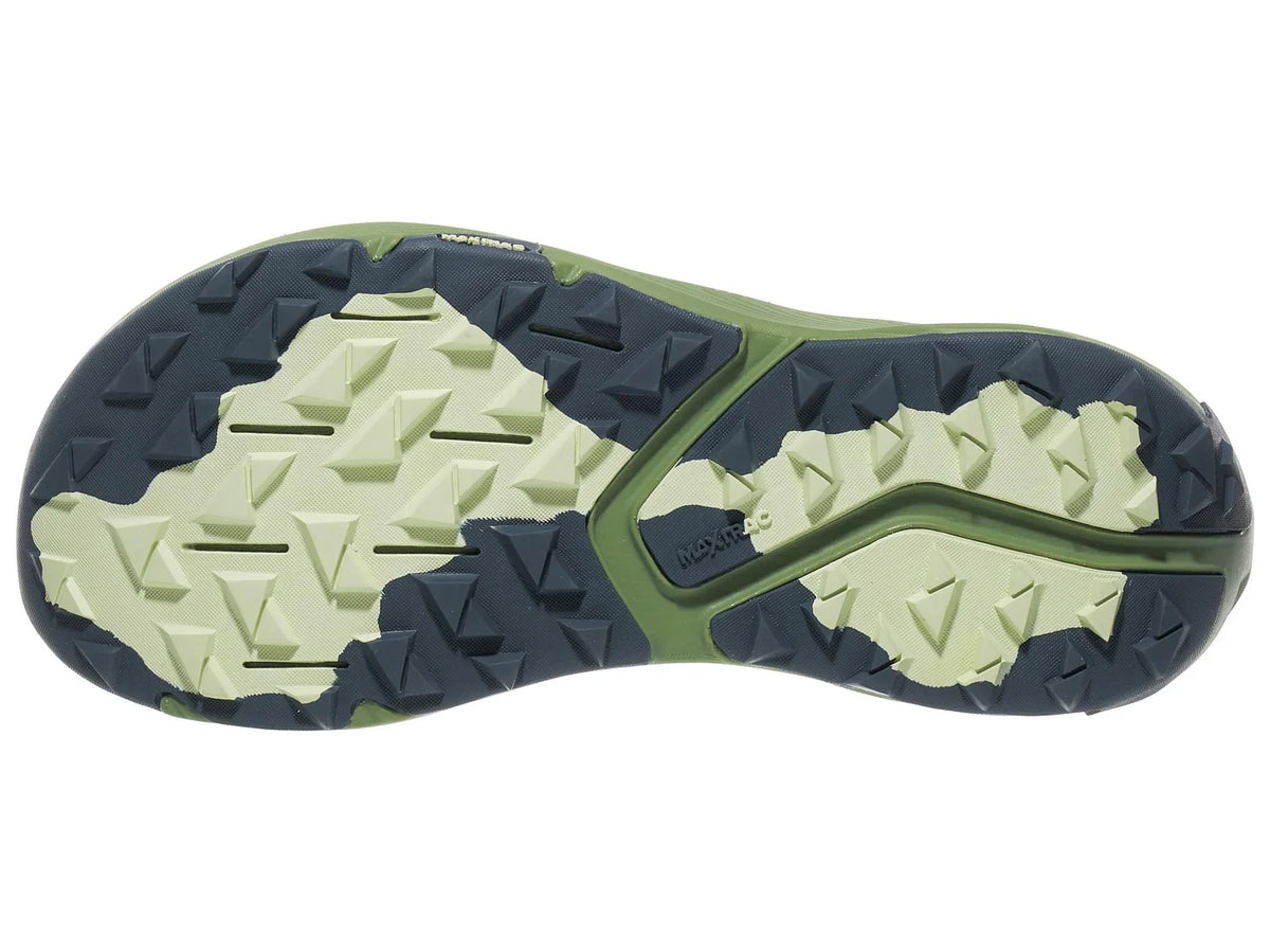Women's Altra Experience Wild 3. Blue upper. Green midsole. Bottom view.