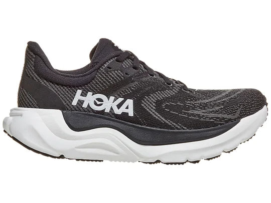 Women's HOKA Arahi 8 in Black/White, lateral view.