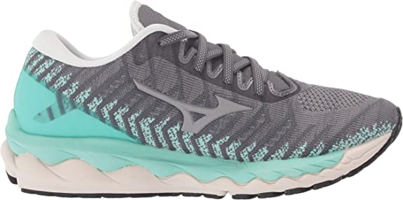 Women's Mizuno Wave Sky 4. Grey upper. Green midsole. Medial view.