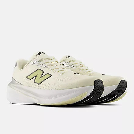 Women's New Balance Fresh Foam X 860 v15. Beige upper. White midsole. Lateral view.