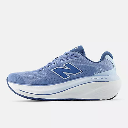 Women's New Balance 860 v15. Blue upper. White midsole. Medial view.
