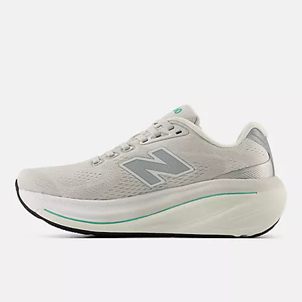 Women's New Balance 860 v15.
Grey upper. White midsole. Medial view.