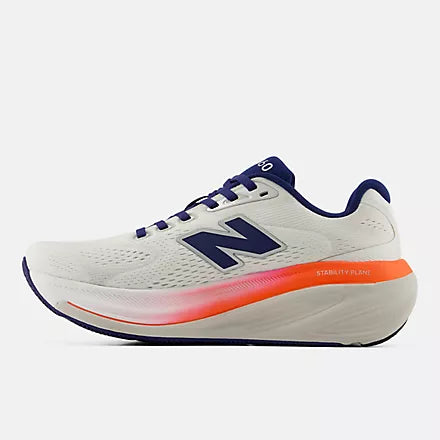 Women's New Balance 860 v15. White upper. White/Pink/Orange midsole. Medial view.